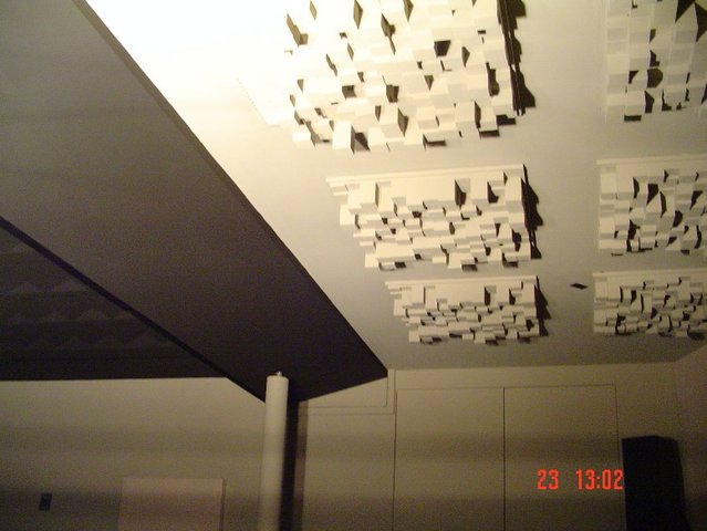 RPG Skylines on Ceiling over seating position - Alos have bulk head angled at 15 degrees to direct reflections off of it to the rear of the room.
